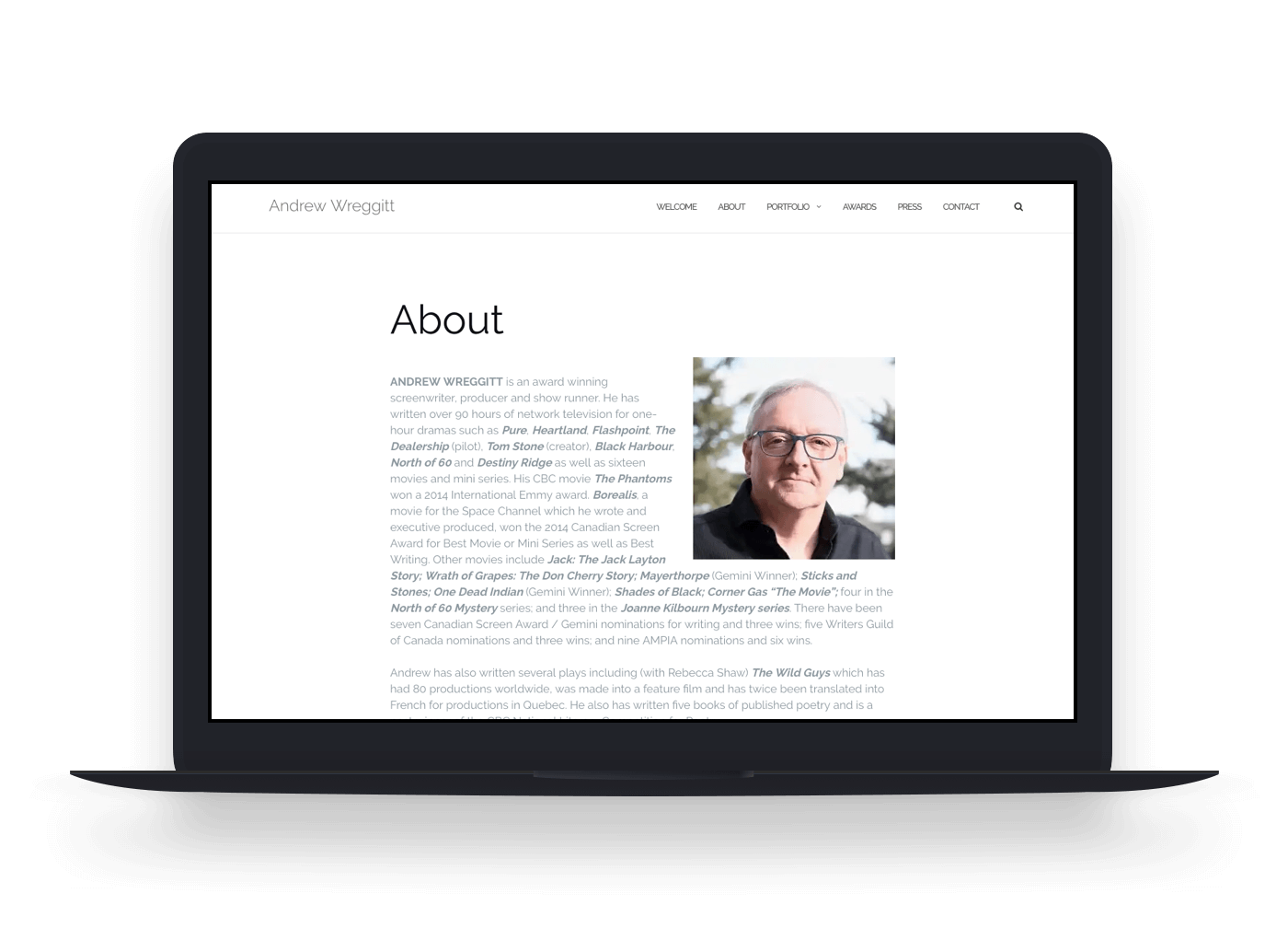 Andrew Wreggitt website - About page on laptop